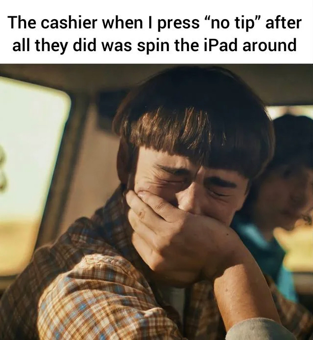 Cashier expecting a tip